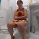 A plump, mature, Eastern-European woman farts, pushes, and takes a shit while sitting a toilet in her hotel room. A single, subtle plop is heard. She wipes when finished. Presented in 720P HD. Over 2 minutes.